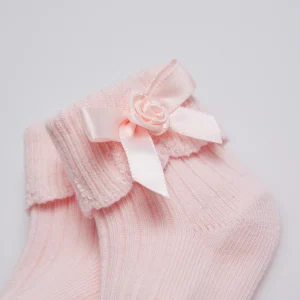 Chaussettes côtelées noeud nouveau-né rose